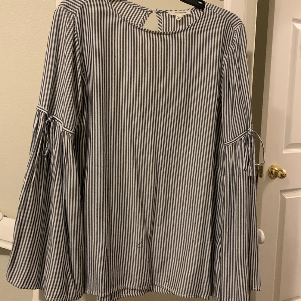 Blue and white blouse with bell sleeves